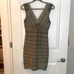 Beautiful golden black bondage dress size medium G by Guess
